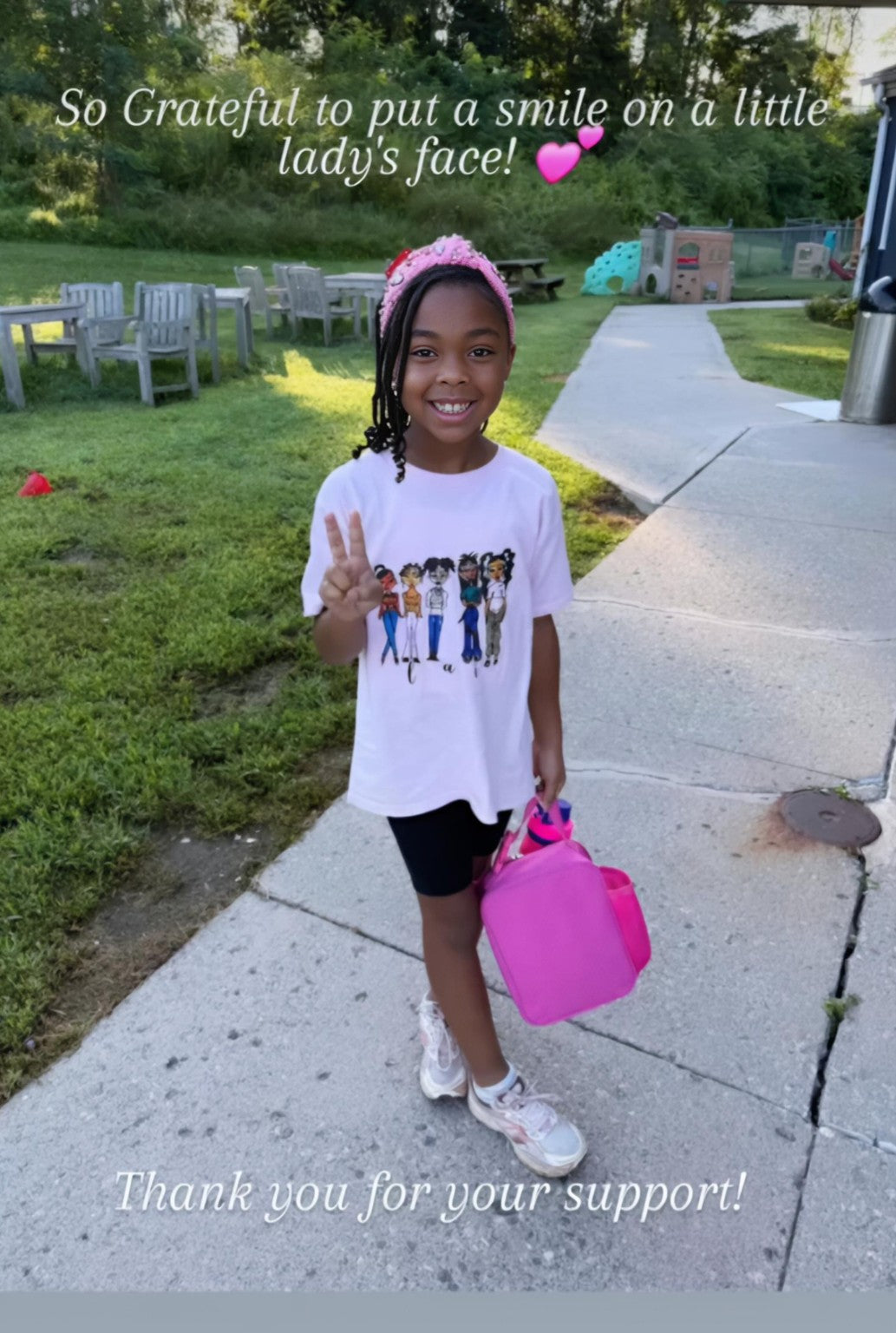 Phoenix wearing her Laicreations shirt outdoors